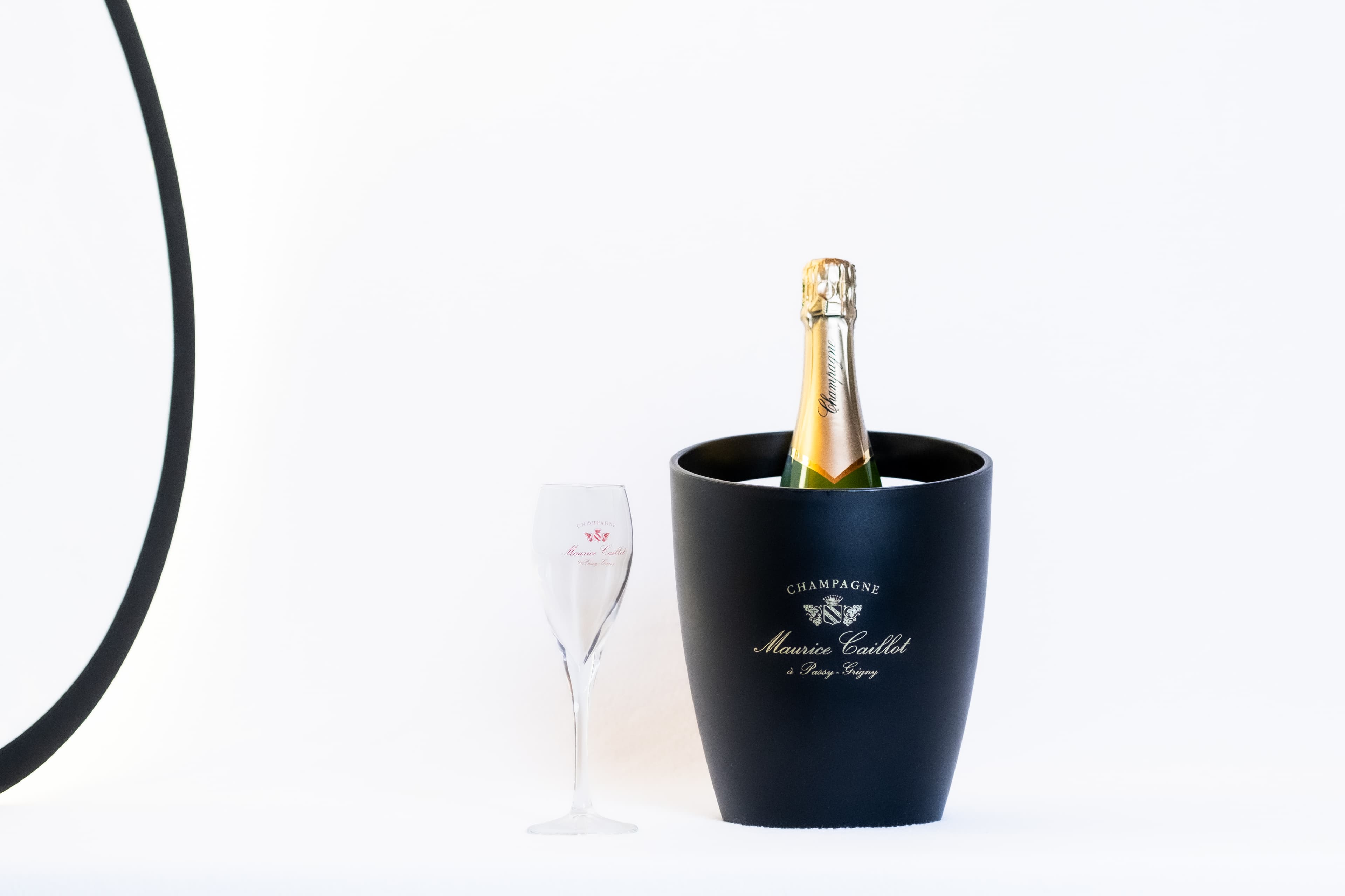 Bouteille de Champagne Maurice Caillot dans son seau